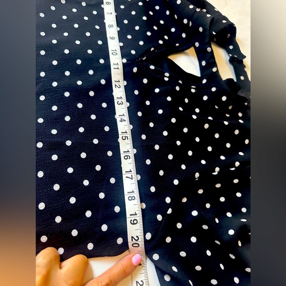 Brand: NAIF, black dress, with white dots, and flared sleeves - Picture 9 of 12